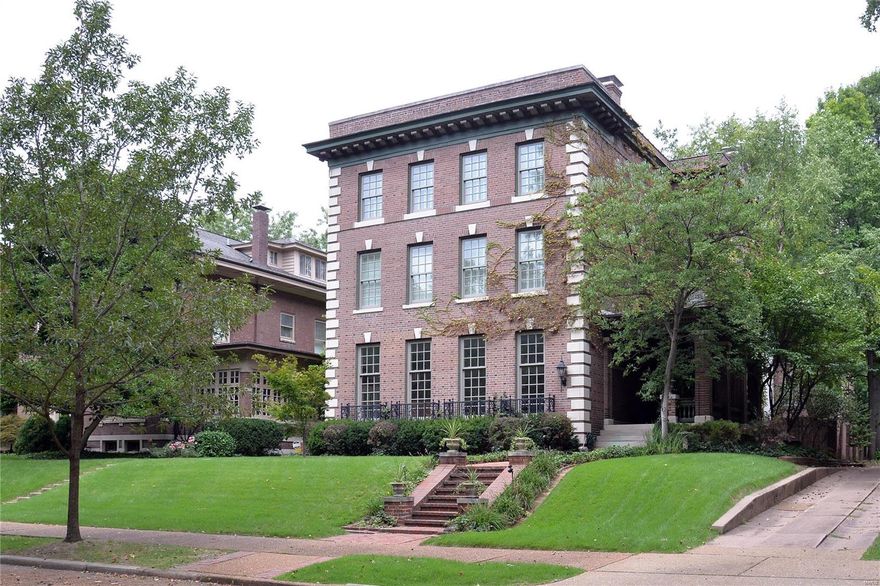 Turn-of-the-century Georgian Federal Revival residence has been meticulously restored down to every detail!  Handsomely appointed with today's conveniences. 3 levels of living space. Marble entry, period millwork, 7 fireplaces, stained glass, 10' & 9' ceilings. The gourmet kitchen features professional grade Viking & Sub-Zero stainless steel appliances, granite, & walk-in pantry. The breakfast room boasts stylish built-ins. The plush master bedroom suite features multi-tray ceiling, dressing room with floor-to-ceiling cabinetry and a center island and state-of-the-art bath with a walk-in shower with a curved glass enclosure. En-suite bedroom with glass enclosed sun porch. 2nd level office & laundry room. The 3rd level has a rec room, gym (can be used as a bedroom), another bedroom & bath.  924 square feet of the square footage is for the guest house which has a living room with skylights, kitchen, laundry room, bed & bath. 4 car garage.  Beautiful grounds with a deck, patio & gardens.