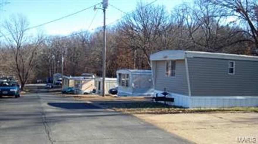Arrowhead Mobile Home Park has 16 developed pads on 14 lots with Mobile Homes for a total of 2+ Acres.   The property is situated near Gravois Bluffs and interstates, with public water, sewer, + electric on site.  An on-site management group can be obtained through owner.  This is a predominately pad owned mobile home park.  The park owns two of the existing 15 mobile homes in place.  An additional mobile home should be added to lot 28 in the near future.    

We are selling the following "as is": 
Parcel ID 02-5.0-15.0-2-001-002 consists of Lots 23,24,25,26,27,28
Parcel ID 02-5.0-15.0-2-001-028 consists of Lots 1,2,3,4,5,6,7,8  

A mobile home community located on the south side of Fenton MO in Jefferson County. Fenton is a suburb of St. Louis, MO and just 22 miles southwest of downtown, St. Louis

An Additional 18 lots can be purchased for $129,000 and developed by new owner, parcel id of 02-5.0-15,0-2-001-002.  Property to be sold "as is" 

Financials provide upon request.