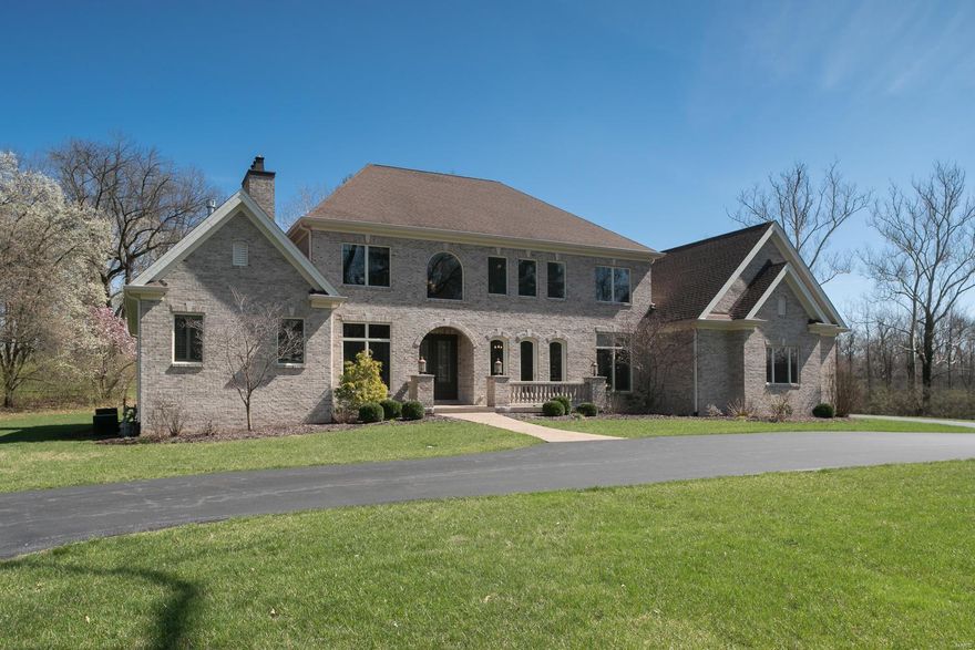 Live where you love, love where you live situated on a manicured 2.9 acres tucked away at the end of a coveted tree-lined private lane centrally located in the heart of Ladue! This is a rare opportunity to own a stunning 12 yr old 5 bed 7 bath Bob Berkley built appointed with all the amenities in a thoughtfully designed sophisticated home. The Great Room overlooking the grounds greets you as you enter the home. Recently painted, updated and enhanced by the seller in calming gray tones, pristine hardwood floors thru-out, and a smartly redesigned sleek chef's kitchen w/SS appliances, 3 dishwashers, new center island, dining banquette, stone countertops, backsplash, pot filler, and wet bar add a contemporary flavor. The adjacent comfortable family room overlooks the grounds & additional outdoor living area w/ fireplace, hot tub and saltwater pool. The lower level completes this oasis with media room, comfy leather chairs, an exercise room, a full bath and a recreation room with wet bar. Additional Rooms: Mud Room