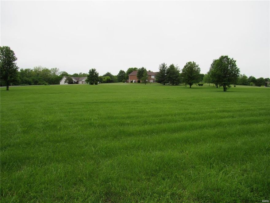 Make your dream house come true!!! Gorgeous subdivision just outside of town has a perfect building lot just for you!! Your builder, your plan, your dream! This property lays beautiful for a walk-out basement with some mature trees to the side and rear of the property! Come out and take a look, you won't be disappointed. Community water and sewer. Additional Rooms: In Platted Subdv.
