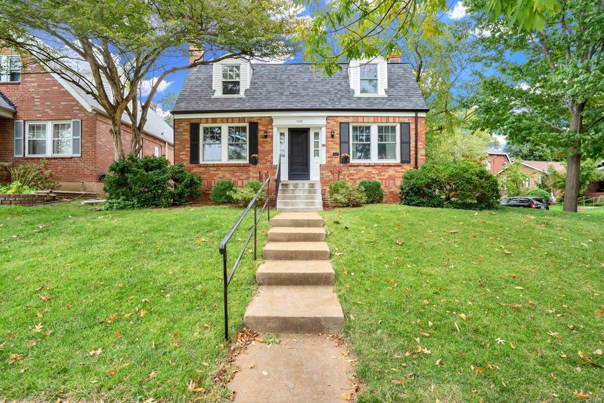 Absolutely charming brick beauty in Richmond Heights! This 1.5 story home sits on a corner lot, has a 2 car detached garage, half bath on the main level and is sure to please the most discerning buyer! Wood floors throughout, an abundance of beautiful leaded glass windows, glass block windows and 2 fireplaces are some of the features that give this home so much character. The main level offers a large living room w/ fireplace, dining room, kitchen & 1/2 bath while the upper level offers 2 large bedrooms and full bath. A full basement adds great storage space and a partially finished room w/ fireplace for a great place to hang out. The covered back porch is a nice place to enjoy morning coffee or summer evenings. The brick patio was re-laid & expanded in '17 for back yard enjoyment and leads to the 2 car det. garage w/ concrete driveway. Updates include new roof & gutters '16, some new windows '15/'16, S/S dishwasher, stove and more!