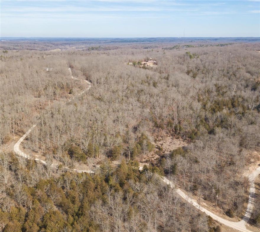 10 acres of pristine woodland awaits you in Dittmer! This expansive lot offers an array of possibilities, from crafting your dream home amidst nature's embrace to creating a recreational haven for hunting, camping, and leisure activities. Nestled within the serene landscape of Twin Fawn Estates, this parcel on Little Deer Drive promises both tranquility and adventure. While currently wooded, this blank canvas invites you to shape it to your desires, whether that entails clearing for construction or preserving the natural habitat for wildlife enthusiasts. Conveniently located near an electric service line, the practicalities of modern living blend seamlessly with the rugged beauty of the outdoors. Don't miss out on the chance to own your own slice of paradise and still be only minutes from the highway. Schedule a visit to this retreat today and let your dreams come true. This is 2 lots sold together (lot 18,19) each being 5 acres: 8716 and 8738 Little Deer Drive. Additional Rooms: In Platted Subdv.