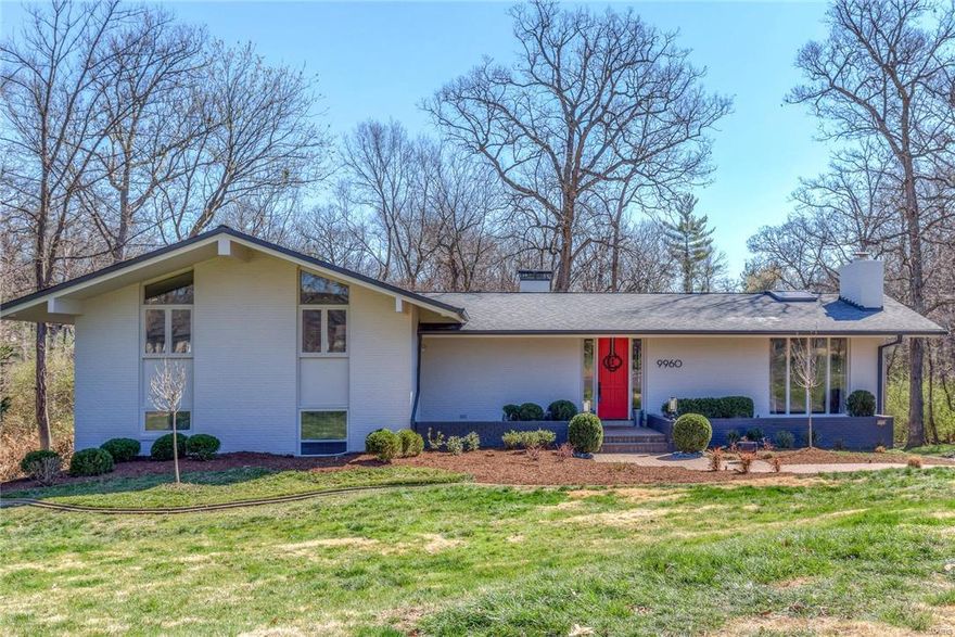 Perfect. Fabulous. Impeccable. This home designed by celebrated architect, William Tao, was just completely renovated by a stylish couple whose taste you will adore. The main level features a Living Room with a gas fireplace, an open Dining Room, Family Room & Kitchen. Hardwood floors, vaulted ceiling and expansive windows are the hallmark of this space. The kitchen is perfect for family gatherings & entertaining. You will appreciate the white granite counters, contemporary backsplash, abundance of cabinets, wet bar with icemaker & high-end appliances. Off of the kitchen is a deck that looks out onto the private backyard. The master bedroom suite is stunning with a vaulted ceiling, reclaimed sliding barn door & a walk-in closet. Wait until you experience the master bathroom! There is a glamorous soaking tub that is located in a wet room with a dual-headed shower. The Lower Level has a full walkout, recreation room with fireplace & another bedroom with full egress. All new systems.
