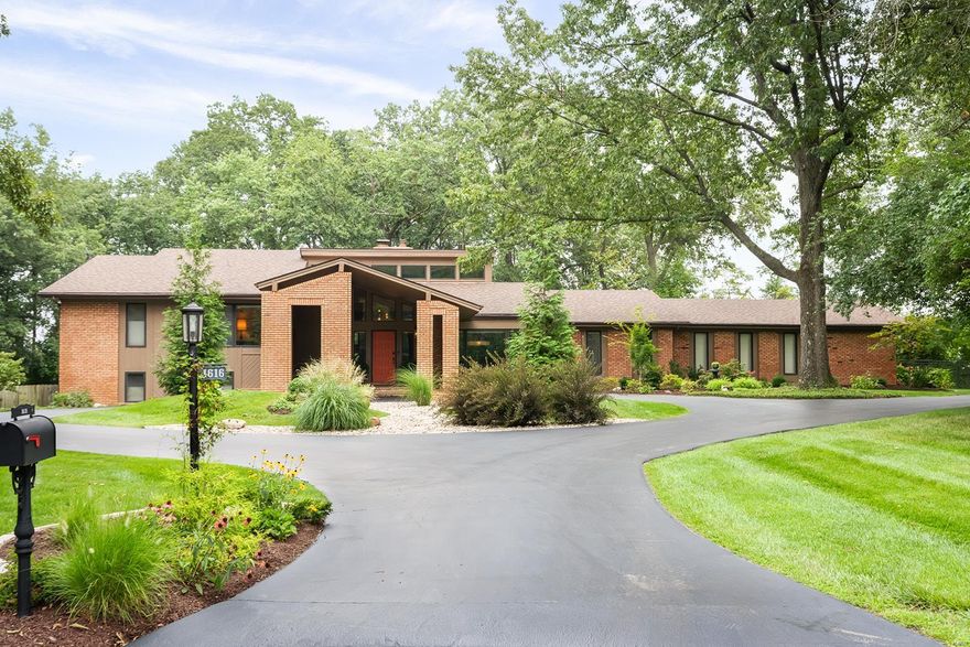 Beautiful multi level, contemporary home located in desirable Frontenac Woods subdivision in Ladue school district. Step inside to an entry way that opens to a spacious great room w/ beautiful floor-to-ceiling exposed brick fireplace. Great room has two drs that lead to the patio and pool & wet bar w/granite countertops. Home also features an updated kitchen w/center island and breakfast area, dining rm with picturesque bay window, powder rm, laundry/mud rm and the Recreation rm walks out to the pool. Master bedroom suite has 2 walk in closets and a wall of closets, large windows overlooking the backyard & pool, separate sitting rm/bedrm with covered Balcony, His & her sinks, soaking tub, and full shower complete the suite. Three other bedrms complete this almost 5,000 sq.ft. home that sits on 1.2 acres at the end of a cul de sac.   Many updates w/features and accommodations for today's living. Partially finished lower with Media Area, 3-car garage with circle driveway Additional Rooms: Mud Room