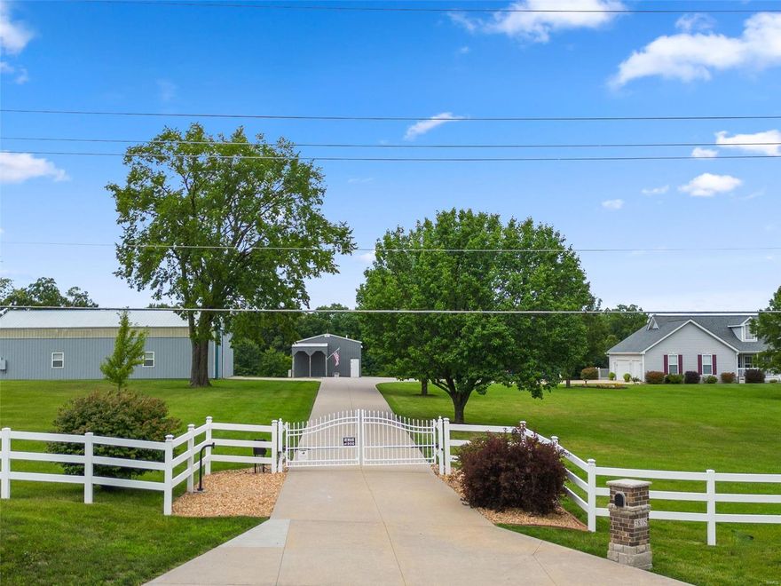 Unincorporated St. Charles Co with Francis Howell schools!  Atrium 3 beds & 2-1/2 baths on the main & great LL. Incredible kitchen has lots of 42" cabinets, soft close cabinetry & granite counters. Huge counter height island w/bar seating and more cabinets. LL offers a sleeping area with walk-in custom closet, another full bath, kitchen w/bar seating, dining area and large family room. Huge covered back deck for sipping your fav drink & watching the sunset, wrap around front deck for sipping your coffee & watching the sunrise, private stocked pond, 3 amazing outbuildings all w/electric and concrete drive access, white farm fencing w/electric gate & much more! The 24x32 metal bldg has a mini split, 1/2 bath & garage opener, 30x40 metal bldg has storage room, workshop & garage opener, 30x60 metal bldg has RV hookups & wired for generator. 2 parcels included (3815 & 3835) for total of 9.31 acres. Bring your horses, critters, RV & other toys to enjoy your own bit of paradise! Agent owned.