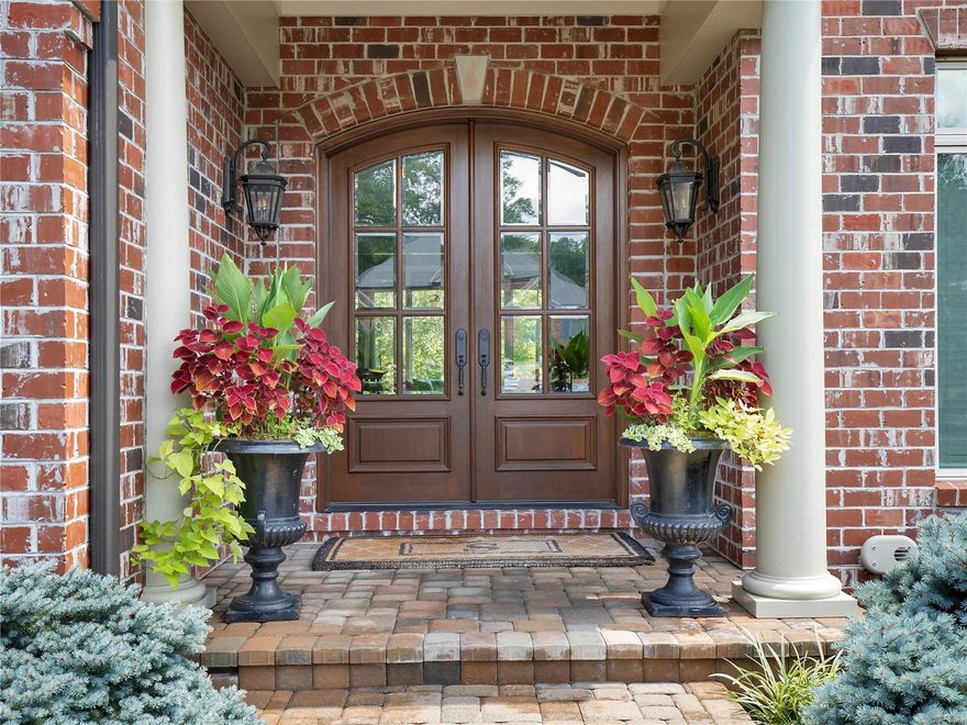 Fabulous 10 year-old custom Rehnquist-built home nestled in a private enclave in Ladue. This well-appointed 6 bedroom, 6 bath home backs to woods and offers all the spaces today's buyer is looking for: private home office, main floor master, open living areas, custom bar, butlers pantry, main floor laundry, finished lower level and 3 car garage. Find office/study with beautiful millwork & gorgeous dining room with designer wall coverings on each side of the impressive two story foyer. Formal living room with fireplace leads to an entertainers bar. Large chef's kitchen with eat in area and breakfast bar opens to a stunning hearth room. The large, main floor master suite, has his/hers closets and separate tub/shower. 4 additional beds on second floor. Finished lower level has another great bar with an additional bedroom and full bath and tons of unfinished storage w/ room for gym or cinema. Terraced backyard with patios and 2 great spaces for a future pool! Additional Rooms: Mud Room