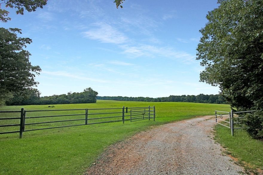 Farm for Sale in Missouri. Farm boarders National Forest. Entering the gates you will see large open grass fields that feature grass perfect for either grazing or hay. This farm boast excellent fence and cross-fencing with pipe corners and gates that is livestock-ready. Entering the property you will find a secluded private road that winds through the woods and opens up to multiple buildings including a 2 bedroom cabin with central heat and air, barn 104'x57', machine shed, garage, small shed and another large storage barn. Next to the cabin the property features a spring that runs and feeds through the property along with two wells. There are several alleyways for easy rotation of livestock including a drive through catch and cattle working area. You will also find multiple springs on the farm, ponds and on the back of the property you will find the stunning Gasconade River that you will own! The owner will consider owner financing with the right circumstances to a qualified buyer.