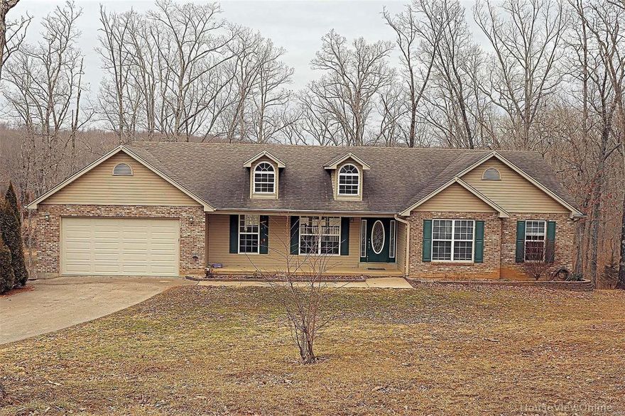 Gorgeous 4 bedroom 3 bath ranch home that sits on 5.47 acres with lake view! Very private! This home has so much to offer! Large covered front porch, oversized 2 car garage. Vaulted ceilings, Great room with brick hearth fireplace, Large eat-in kitchen with custom cabinetry, breakfast bar and stainless steel appliances. master bath suite with walk-in closet, jetted tub with separate shower. Full walk-out basement with Rec room and 4th bedroom. MORE PICS TO COME!