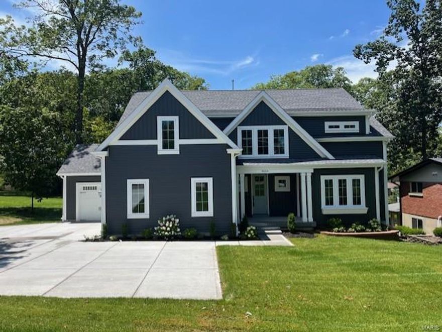 Spectacular  1.5 story just completed by Boulevard Custom Homes.  This 5 bedroom, 4.5 bath, home features astounding finishes which include a 3-car garage, hardwood flooring 1st floor and 2nd floor hall/bonus room, gourmet kitchen with true custom cabinetry, large island, crown molding, soft close drawers, pull-out spice rack, trash pullout, Quartz countertops, stainless steel appliances, under cabinet lighting, large walk-in pantry, built-in lockers, and impressive screened in rear porch with fireplace.  12' high beamed ceiling in great room offers a gas fireplace. Elegant master bath suite has crown molding, large walk-in closet, adult height vanities, stand alone tub, spacious shower with heavy glass surround. Other amenities include  wood treads on stairs, expansive 2nd floor bonus room, 2 full baths on 2nd floor, large bedrooms w/walk-in closets.  Finished lower level with rec room, bath, and bedroom. Additional off street parking. 8' tall garage doors.  Large rear yard. Additional Rooms: Mud Room