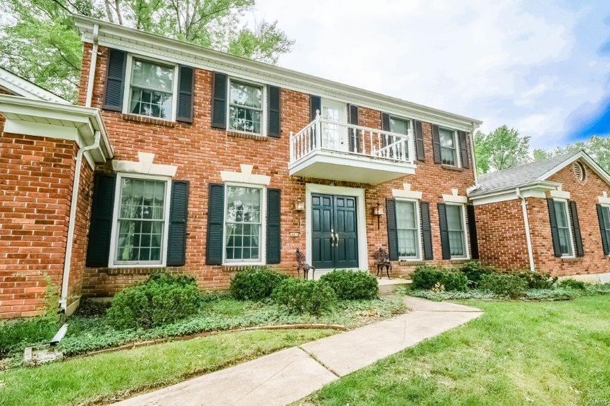 Lovely 4 bedroom 2.5 bath, 2 story full brick masonry home in the popular Ladue Trails neighborhood. Living room features floor-to-ceiling brick fireplace with raised hearth, wood floors, paneled wood walls, and custom built-in shelving. Sitting room with wood flooring connects to living room and walks-out to deck. Formal dining room has wood floors, chair rail, and crown molding. Eat-in kitchen has recessed lighting and 2 pantries.  Upstairs you will find all 4 bedrooms. Master has 2 closets and en-suite bath. Other 3 bedrooms, one with wood flooring, shares bath in hallway. Lower level has large recreation room and laundry. Rear entry 2 car garage and level, private back yard.  Conveniently located at 141 and Ladue Rd it offers quick access to I-64.