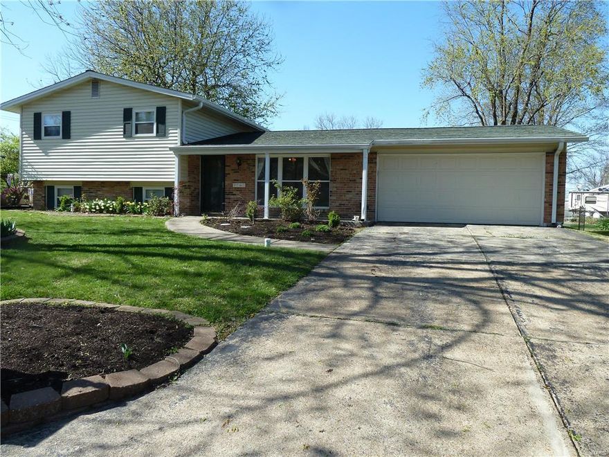 Brick & vinyl sided multi-level with 2-car attached insulated garage sitting on spacious fenced yard. Clean and move-in ready. Lots of recent updates providing lots of reason to view and purchase this house. 4 yr old high quality laminate floors in the living room and kitchen. 2 yr old carpets in the family room and bedroom 2. The other bedrooms have wood floors. 2 yr old double pane insulated tilt windows. The 1 yr old remodeled kitchen features 42" soft close cabinets and drawers and dove tailed drawer assemblies. Most of the lower level cabinets have pull out shelving. The hard surface counters are quartz and the back splash is glass tile. The sink is extra deep and all the appliances are stainless steel and all will remain with the house. Both baths have some recent updates. The lite fixtures are new or newer, there are white 6 panel doors, lots of crown molding and most of the interior has been freshly painted. There is a 36 x 13 patio and a 20 x 13 outbuilding. HSA Warranty.