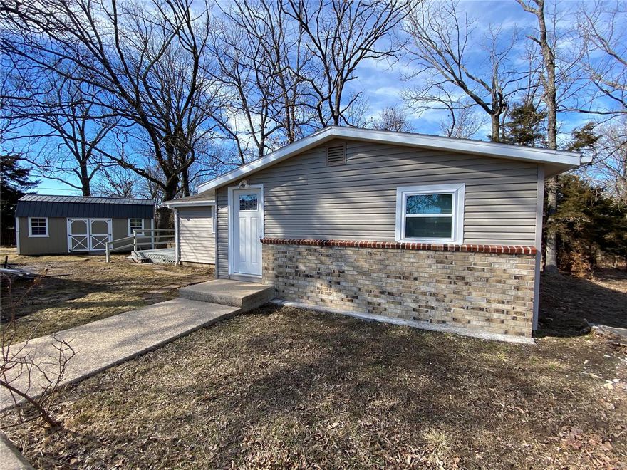 Quaint and cozy describes this newly updated 2 bedroom, one bath home with easy access to I-44 and minutes away from schools, stores and Ft Wood.  This clean and tidy home features an eat in kitchen plus utility room, with new tilt-in windows, new flooring and paint.  Home includes a large work shop plus a small storage shed. Schedule your appointment today to see this gem of a house.