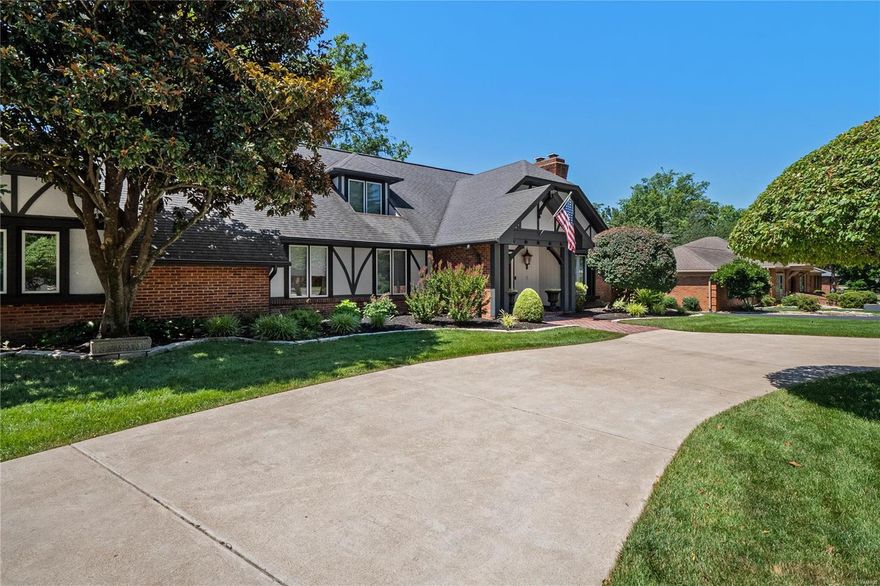 Comfortable Elegance and meticulous care is featured in this large 1.5 story family home on an awesome lot backing to stocked lake reserved for the residents.  Manicured yard with a circle concrete front driveway, 3 car rear entry oversized garage & a serene private setting with a patio and nearly acre lot. Marble floor entry, gas fireplace in living room with french doors to the family room which has a vaulted ceiling, wood floors, and wet bar. The spacious master bedroom on the main floor is like a retreat with a fireplace in the attached sitting room, a glorious bathroom with separate closets & a door to the back patio. Chef's kitchen with gas cooktop, electric ovens, pasta sink at the bar. Craft room off the main floor laundry.Massive finished lower level with approximately 2200 sq ft' with lots of separate options for recreation/game, office, and workout areas plus a wet bar, refrigerator, wall microwave and a 1/2 bath.  Easy access to highways. Lots of amenities. A Rare Gem!