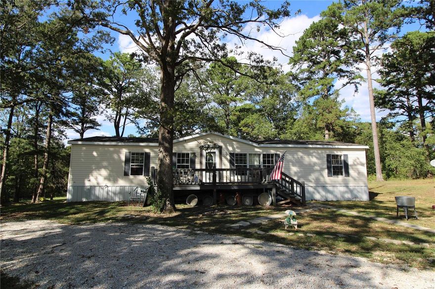 Conveniently located between Van Buren and Ellsinore, this three-bedroom with office and two full bath mobile home is nicely situated on 7 acres. Open floor plan with C/H/A, wood burning fireplace, large deck, detached storage building and a big shaded yard. All of this on a dead end paved road. No traffic problems and plenty of privacy.