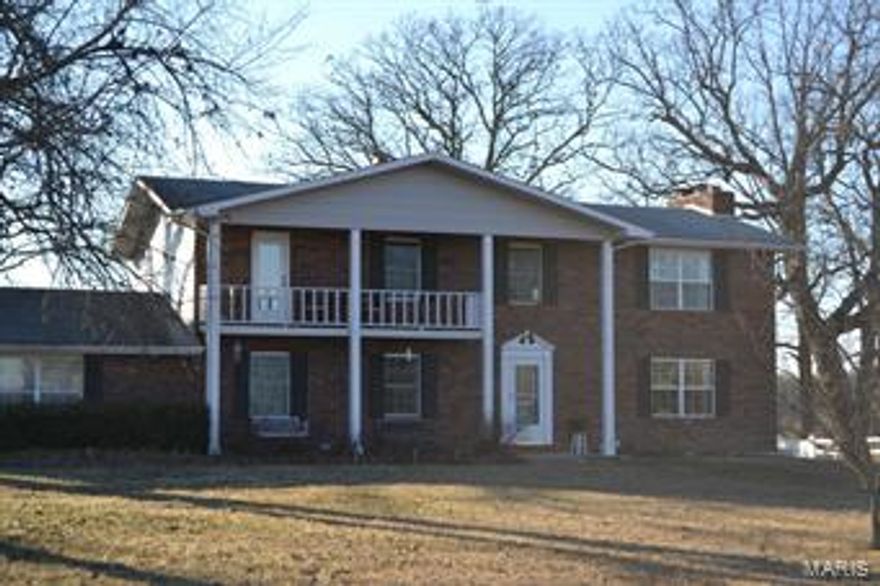 PRICE REDUCTION!  TURN RIGHT OUTSIDE ST JAMES CITY LIMITS!   EXCEPTIONALLY NICE 2 STORY HOME WITH A BALCONY TO SEE FOR MILES!  HOME HAS SO MUCH TO OFFER--- LARGE UPDATED KITCHEN WITH CUSTOM HICKORY CABINETS OFFERING STORAGE GALORE.  DINING AREA OVERLOOKS THE PATIO AND LARGE GREAT ROOM WITH WOOD BURNING FIREPLACE  FLOWS INTO THE PATRIOT SUN ROOM---GLASSED ON THREE SIDES WITH STUNNING VIEWS OF THE 26+ ACRES.  UPPER LEVEL OFFERS 4 BEDROOMS AND 2 FULL BATHS.  OVER SIZED MASTER BEDROOM SUITE HAS DOUBLE CLOSETS, SITTING AREA AND A NICE MASTER BATH AREA WITH SEPARATE TUB AND SHOWER.  FRONT BEDROOM WALKS OUT ONTO BALCONY WITH GORGEOUS VIEWS OF A VINEYARD.  HOME HAS 2 HEATING AND COOLING UNITS AND THERE IS A PARTIAL BASEMENT.   OUTSIDE YOU CAN HAVE A FEW HORSES OR COWS AS THE PROPERTY IS PERIMETER FENCED AND THERE IS A POLE BARN TO STORE THE HAY OFF THE ABUNDANT PASTURE. CUTE 2 STORY SHOP/POSSIBLE ART STUDIO-- REMEMBER THOSE GORGEOUS VIEWS! OR IT WOULD BE AN OUTSTANDING PLAYHOUSE FOR THE KIDS! Additional Rooms: Sun Room