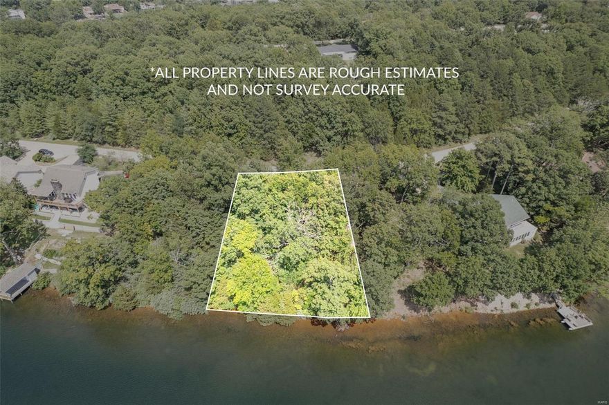 Build your home on this fantastic waterfront lot on Lac Carmel! Lac Carmel is approx 57 acres. Terre du Lac is a private lake community 1 hour south of STL. 16 lakes, beaches, fish, boat, swim.  Terre du Lac Country Club and golf are available. Buyer is responsible for hookup of water and sewer.