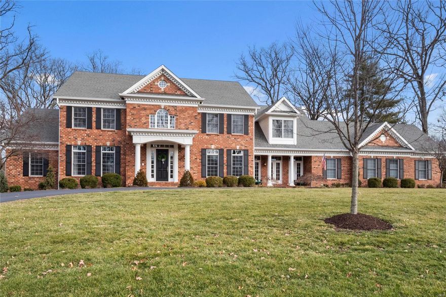 Check out the video! Extraordinary 6 bedroom classic 12 year young prodigious colonial on a parklike 1 acre lot with heated pool, covered back patio & 4 car garage. Pull into private Holiday Ln, you will be impressed by the inviting circle drive, red brick exterior, covered front porch, french doors & well manicured yard. The interior is just as impressive- elegant curved staircase, 10" crown moldings, 5 fireplaces, marble floors, custom wood ceiling/wall moldings, 2 story entry & great room, gleaming hardwood floors and designer lighting. The heart of this home is the gorgeous chef's kitchen, breakfast room & barrel ceiling hearth room with stone fireplace, custom bookshelves and amazing views out the backyard. Custom kitchen offers 2 islands, high-end stainless appliances plus bonus walk-in pantry. Main floor master suite features his/her custom closets and vanities, Jacuzzi tub & walk-in shower. Prof finished walkout lower level w/ full kitchen. Welcome Home!