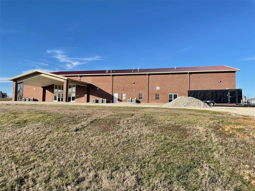 This 16,550 steel, clear span construction building on 4.5 acres is currently being used as a church, but its possible uses are many -- an education facility, corporate headquarters, or wedding venue to name just a few.  Six classrooms/private offices and newly remodeled public restrooms surround the sanctuary/worship center, which could be used for large meetings or corporate events.  Several other larger classrooms, meeting rooms, offices, and additional restrooms make up the east wing, along with a large kitchen being constructed with front and back of house setups, a loft/balcony under construction, and gymnasium/event center with two sets of double doors. Location: City, Industrial Area