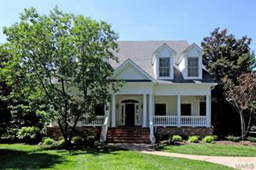 Situated on a private 1.3 acre lot, find this gracious colonial in one of Ladue's most sought after neighborhoods.  Built for the current owners, this light filled 20 year old custom home offers beautiful hardwood flooring throughout the first floor, a 2 story great rm with floor to ceiling windows, formal living and dining rms, and a  bright white custom kitchen with center island that opens to the hearth rm with 3 walls of windows and fireplace. A main flr master suite with updated luxury bath and walk in closet, first floor laundry and a lovely guest powder rm comprise the first floor.  Upstairs find a bedrm suite, and 2 additional bedrms that share a jack and jill bath.  The lower lev offers a large rec rm with walk behind bar, fireplace, full bath and a possible 5th bedrm with lookout windows.  The hearth rm walks out to a lovely deck, an inground pool and a very private expansive backyard.  A 3 car gar, high ceilings, built ins and more complete this beautiful property.