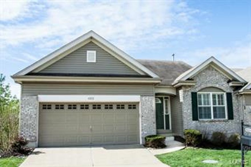 Enjoy a more carefree lifestyle in this “like new” villa. Pristine 2-bedroom, 2 bath – one level living!  Entry foyer with beautiful wood floor. Large open kitchen with 42-inch cabinets, breakfast bar, & walk-in pantry - opens to breakfast room with access to the relaxing deck.  The open living room/dining room boasts a gas fireplace & offers plenty of entertaining space.  Spacious master bedroom provides walk-in closet plus large linen storage & a gracious master bath with soaking tub & separate walk-in shower (with seat).  Secondary bedroom & bath offer nice privacy from the master. The expansive unfinished walk-out lower level (one of the very few walk-out units!) has rough-in plumbing & awaits your finishing touches.  New carpeting (April 2015), 9 ft ceilings on main level, main floor laundry with laundry sink, & plantation shutters are a nice bonus.  1-yr home warranty offered.  Don’t hesitate. Nothing to do but move in & unpack! Refrigerator, washer/dryer stay in as-is condition. Location: Corner Location, End Unit, Ground Level, Suburban