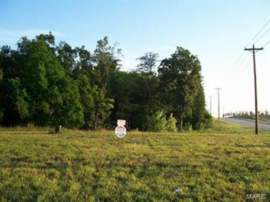 2 acres m/l prime development property subdivided from larger tract. Location: High Traffic, Hwy/Interstate Frntg