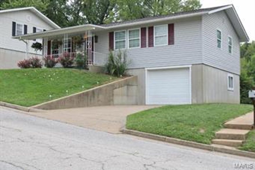 CHARMING RANCH HOME! 3 bedroom, 1 1/2 bath home features a great kitchen/dining combo with tons of cabinets and a large pantry, large living room and third bedroom closet offers hookups for main floor laundry if desired. Full, unfinished basement with shelving for storage and 1/2 bath, 1-car tuck under garage with walkout to back yard. Large back deck and covered front porch. Home has had many updates throughout.