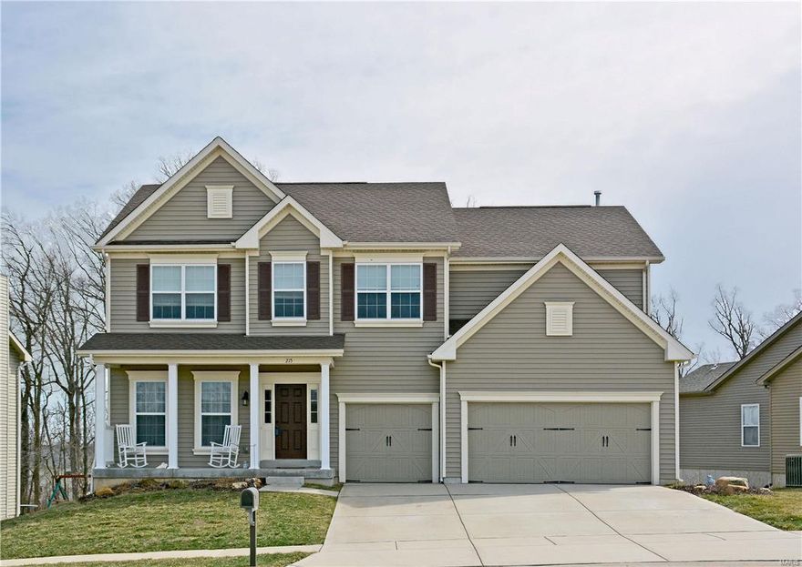 A picturesque setting, backing to woods and a lake, is the perfect setting for this 2 story. The home features 5 bedrooms, 2.5 baths and over 3,300 square feet of comfortable living space. Special amenities include an open floor plan, a neutral decor, 9' ceilings, new hand scraped hardwood flooring and granite, upgraded lighting fixtures and 2.5" blinds. set on a level .21 acre lot, with a new deck, and stone fire pit. Upstairs, the master suite includes a spacious bedroom with large walk in closet and adjoining bath, separate tub and shower, double bowl vanity.  Three oversize bedrooms all with walk in closets and open loft complete the second story.  Lower level contains legal bedroom with lots of natural light. This home is conveniently located just minutes from Wentzville's fabulous shopping, dining and easy access to I-64, 70 and US 61. Carlton Glen offers a friendly neighborhood lifestyle with special amenities, including a community pool and playground. Don't miss out!