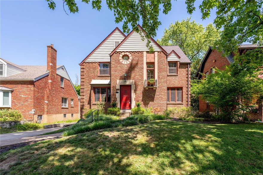 Est. 1936 Charm abounds in this 4 bed/2.5 bath University Park brick home with over 2500 sq ft of living space! Classic architecture blends with beautiful updates...hardwoods, gorgeous stained glass, pristine period millwork and foyer with stunning hand-crafted curved staircase. Large living room perfect for family gatherings with wood burning fireplace and built-ins. French Doors open to a screened porch overlooking the backyard with lush, mature landscaping. Modern kitchen with custom cabinetry, quartz counters, subway tile backsplash and stainless appliances. Spacious dining room and 1/2 bath complete the 1st floor. Upstairs you'll find the primary bed with en suite bath, 3 addt'l good sized bedrooms and updated full hall bath. LL with rec room offers more living space! 2 car attached garage! No surprises with new HVAC and newly lined sewer under the home. Walkable to neighborhood parks and schools and close to all the U City Loop has to offer. Don't miss out - it won't last long!
