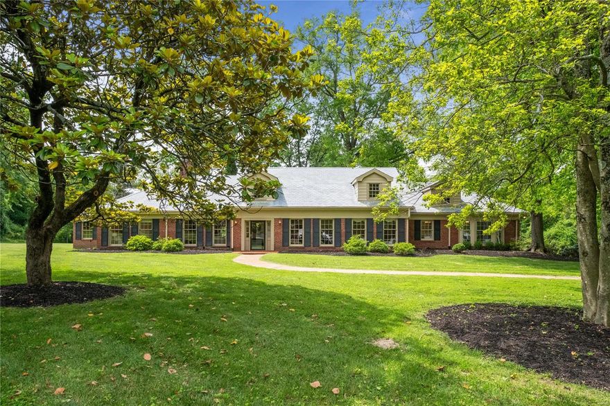 Ranch-style homes come in all shapes and sizes, but this 1 commands both curb & interior appeal far superior to any other! Nestled on 2.26 acres in one of Ladue's most notable neighborhoods, Log Cabin Lane. Epitome of simple living & privacy w/ a primary wing built in 2008 separate from guest suite wing at opposite side of home - designed by renowned Donna Box, the primary wing provides a home office, superior closets & a bath fit for a king/queen. Generous ceiling height thru out home w/ lovely LR & DR off foyer. Den, hearth & brkfst rooms bring everyone together & are open to kitchen w/ some newer appliances. Instead of a musty, wet basement below grade, be surprised by the stairs to upper leading to generous attic storage space. Synthetic slate roof in 2008, 2 car garage, irrig system & loads of turkey-loving acreage to expand upon. Dream big or live simply in this gracious sweeping ranch. Owner prefers to sell as is. Walk to schools, golf courses, shops, eateries & watering holes.
