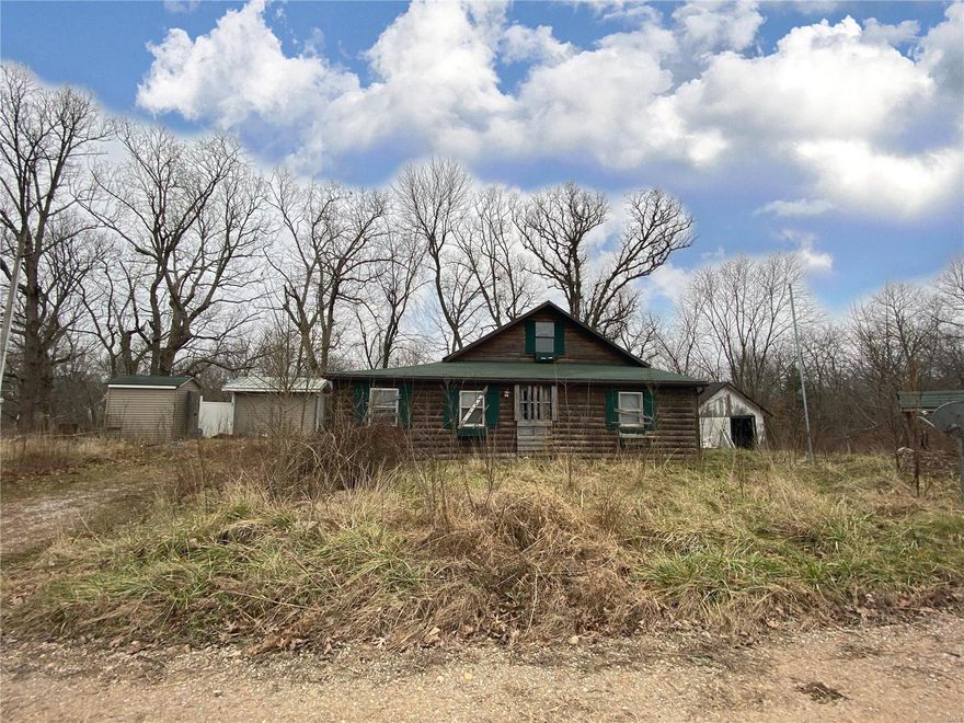 LOOKING FOR A WEEKEND GETAWAY???  This unique property is a cabin located directly on the river with a wonderful view of the Gasconade River, close to what locals know as the Brownfield area. The cabin needs some TLC and has been vacant for a extended amount of time.  Therefore all utilities and such are not disclosed and is being sold “AS IS”.  The location of the property is within walking distance from the Anna Adams access which is approximately 400 feet. Multiple outbuildings / sheds.