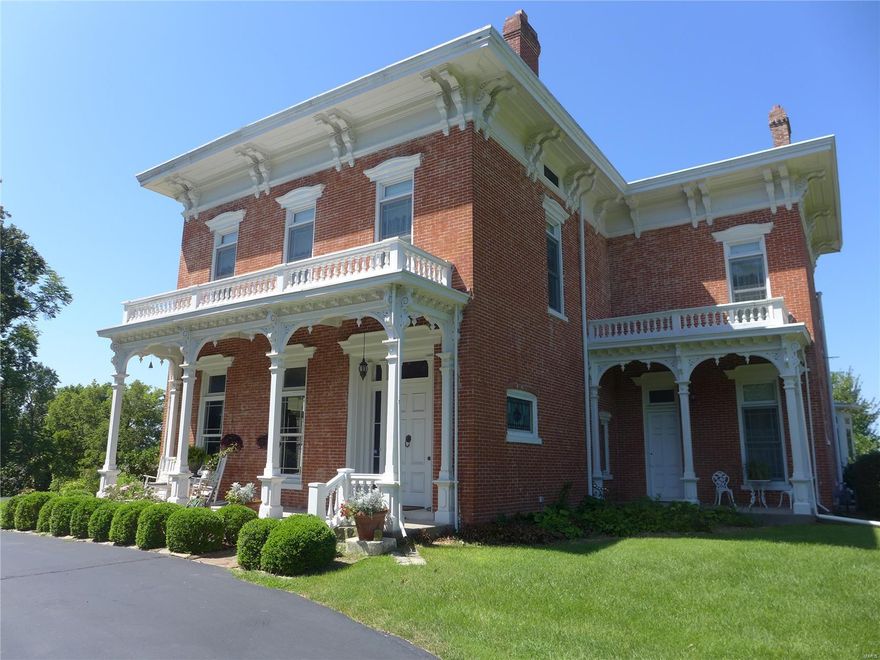 One of Hannibal's architectural gems is available. Italianate home sitting on 5.64 acres complete with gardens and gazebo. Retains many original features. Double parlors with original millwork have updated electric log fireplaces. Spacious dining room with original light fixture and a stained glass window is a treasure. 2 story addition houses a state of the art kitchen, Butler's pantry, breakfast room with 5 bay window seat, sitting area, 2nd floor Master Bath, walk-in closet, and 2 story veranda. Completed in 2007 it reproduces all the Italianate features. 4 spacious bedrooms on the 2nd floor w/ 4 full baths. Brick has been tuck-pointed. 5 porches provide incredible outdoor living space. Belvedere accessed off back staircase leading to attic. Elevator added for 1st/2nd floor access. Private drive has been enhanced with electrical street lights & 150 Stella D'oro day lilies. Stamped concrete patio and winding sidewalk lead to the shade garden with brick patio. Sprinkler system added. Suitable for Bed/Brk Some Accessible Features Additional Rooms: Mud Room