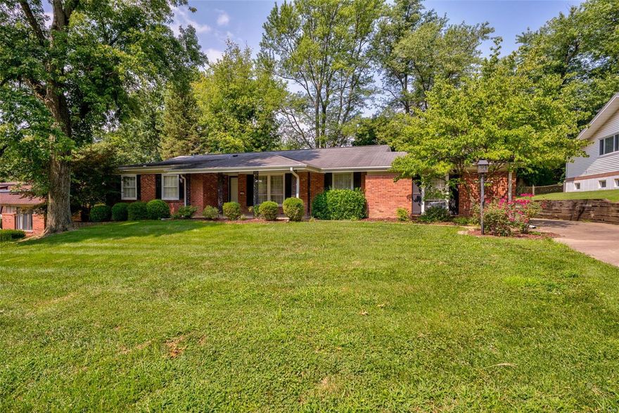 Home is to be sold in AS IS condition. Traditional full brick masonry ranch home with 4 bedrooms and 2 baths in the heart of Chesterfield. The home has a living room with hardwood flooring, built-in shelving, and a brick raised hearth wood burning fireplace, that walks-out to a patio; dining room and sitting room have hardwood flooring; eat-in kitchen flaunts plenty of cabinetry. 3 bedrooms share hall bath and master has ensuite bath, walk-in closet, and hardwood flooring. The lower level offers an additional sleeping area/office/workout room with carpeting.  Outside you will enjoy a level yard, patio, and a 2-car rear entry garage. Located in the top-rated Parkway Central School District, walking distance to Faust Park/Butterfly House, and close proximity to highways and restaurants.