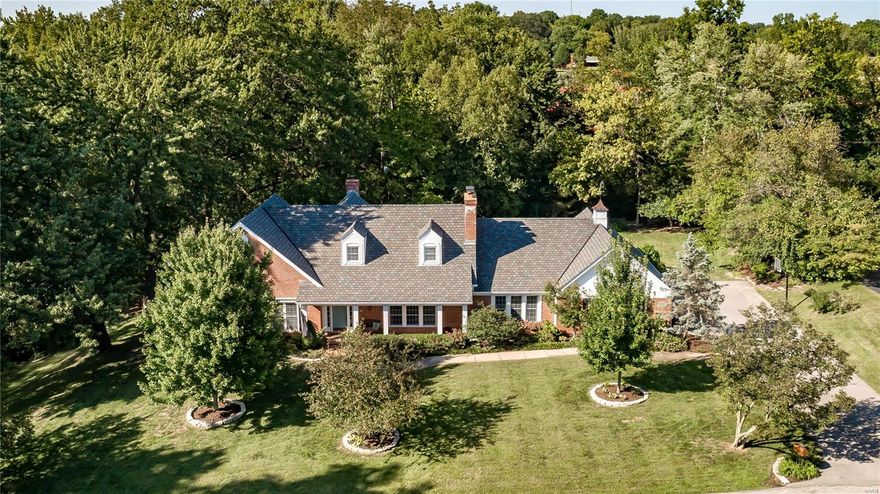 Lush professional landscaping set the tone for this Ladue gem in sought after neighborhood.  Liv Rm and Din Rm with fireplace are perfect for formal gatherings, while the family rm with fireplace and wet bar opening to bright updated kitchen with stainless and granite, offer plenty of rm for informal gatherings.  Walk out to the gorgeous private patio with pergola and water/fire feature.  An updated luxury bath and walk in closet highlight the main floor master suite. An office, laundry rm, and 2 guest powder rms complete the first floor.  Find 3 lg bedrms, 2 updated luxury baths and loft area on the second flr.  The huge lower level with rec rm, large office, and possibility to add a bath provides tons of additional living space as well as great storage throughout.  3 car garage, beautiful level backyard and private path leading to MICDS track and field complete this gracious property.  Newer roof, gutters, baths, some HVAC, landscaping and more.