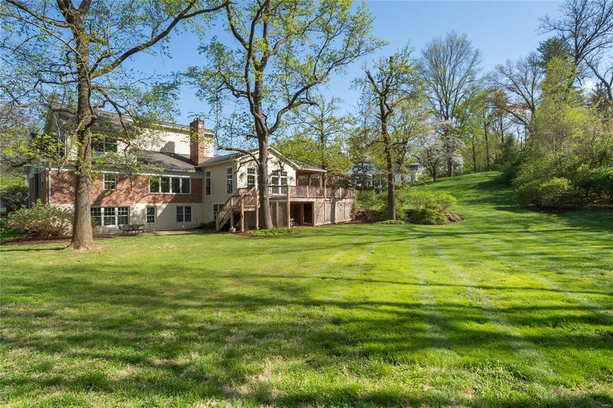 This stunning 1.5 story home is situated on a sprawling 1-acre private lot & boasts exquisite features throughout. Large entry brings you into a spacious floor plan w/ high ceilings & sleek hardwood flrs. Bright & spacious dining rm seamlessly flows into the beautifully designed kitchen adjoining Huge Sunlit Great Rm feat. 11 ft ceilings & lots of windows, wet bar & walk-out to the vaulted ceiling covered deck. The ideal design for hosting guests w/ an outdoor kitchen & plenty of space. Convenient main flr laundry/mudroom offers a private office nook Too. Main flr Primary Suite feat. BRAND NEW LUXURY BATH w/ double sinks, soaking tub, & walk-in shower. Second floor offers ample space:3 bedrooms & 2 full baths. Large finished lower level provides many possibilities with family/rec room & full bath. Bonus 21x19 shed underneath the house for storage. Enjoy the great walkability of the area, or retreat to the privacy of your own backyard oasis surrounded by beautiful trees. Additional Rooms: Mud Room