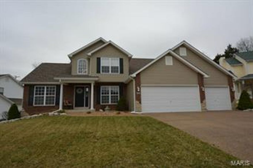 Gorgeous 4 BR 3.5 BTH 1.5 sty that shows like a display! Great curb appeal w/brick front & vinyl siding, new roof, lush landscaping & 3 car oversize garage. Beautiful interior features an open floor plan, updated flooring & fresh modern paint tones throughout. Walk in the grand 2sty foyer w/gleaming HW floors, you'll see the arched entry to the dining rm. The vast great rm features tall ceilings & gas FP surrounded by windows. You’ll love the eat-in kitchen w/custom cabinets, granite countertops, tile backsplash, breakfast bar, stainless appliances, pantry, work station, breakfast rm & bay window w/slider leading to the patio & level backyard perfect for outdoor enjoyment. Luxurious MF master w/walk-in closet, deluxe bth w/soaking tub & sep. shower. Upper lvl offers a sitting rm, 2 add'l BR & full BTH. Newly finished LL, ideal for entertaining, has a large rec rm w/wetbar, family rm, 4th BR & full BTH. Great location close to major hwys, shopping, new water park & Wentzville schools!
