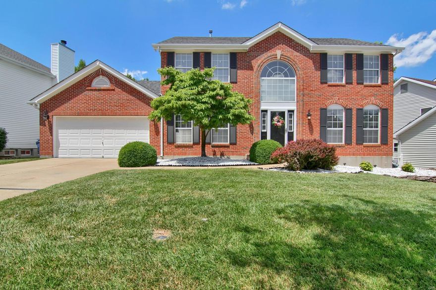 Wonderful opportunity in the sought after neighborhood of Chesterfield Farms.  Spectacular move-in ready home with newly renovated designer kitchen, open floor plan, gleaming hardwoods throughout, fresh paint/fixtures and updated bathrooms. This home boasts a bright and open floorplan with over 3,400 square feet of living space including a finished lower level with rec room and full bath. Inviting 2-story entry, wood burning fireplace, panel doors, bay window, recessed lighting, built-ins and vaulted ceiling master suite. Separate dining featuring wainscoting, crown molding and convenient main floor laundry. Stately brick elevation, maintenance free vinyl siding, large patio and level fenced yard. Other features include: inground sprinkler system, new HVAC system, and security system. Enjoy the wonderful features of Chesterfield Farms subdivision; community pool, tennis courts and clubhouse. Home located in the award winning Rockwood school district.