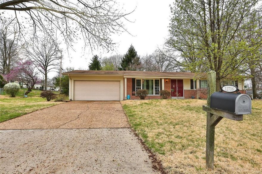 Fabulous 3 Bedroom, 2 full Bath, Ranch style home located in a cul-de-sac with 1900+ sq ft of living space & an amazing, well designed floor plan.  Brick accent with vinyl siding & covered columned front Porch welcomes you into the Entry way with tile flooring & opens to the Living room.  Incredible Living room & adjoining Dining room feature beautiful wood flooring.  Fantastic eat in Kitchen features tile flooring, custom cabinetry, granite counter tops, tile backsplash, deep sink, chair rail, a walkout to the back Patio & appliances including a dishwasher, built in microwave & a gas oven/range.  Master Bedroom Ensuite with wood flooring, double door extended closet & private Bath with tile flooring, shower & more.  Secondary Bedrooms offer double door closets.  Hall full Bath with tile flooring & tile surround shower with tub.  Lower level offers a Rec room, Den & access to a storage room with workshop/hobby area.  2 car oversize Garage with walk out.  Level back/side lot & Patio.