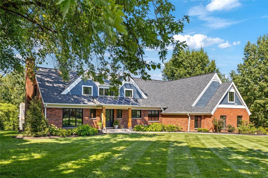 Extensively renovated brick 2 Sty on parklike 1+ acre grounds. Open floor plan features distinctive design elements & contemporary amenities throughout including detailed trim work, expansive windows & wide plank oak flooring that extends throughout the main floor. Impressive 2-sty foyer leads to private study with custom built-ins, paneled dining room & stunning great room highlighted by floor-to-ceiling brick fireplace. Designer kitchen with 42” white cabinetry, quartz countertops, KitchenAid appliances & 10’ center island adjoins light-filled gathering room with wine bar. Hardwood floors continue to the 2nd level with vaulted primary bedroom suite with luxury bath with expanded shower plus 4 additional bedrooms & 2 full baths. Lower Level includes recreation room & game room with brick & timber-lined walls & full bath. Sliding glass door opens to covered terrace with grilling station, outdoor living room with full-height fireplace, game court & pool surrounded by landscaped gardens. Additional Rooms: Mud Room