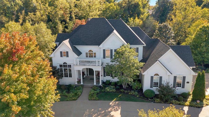 Gorgeous 1.5 story home in gated community with so many features to love & enjoy. Stunning two-story GR w/ cathedral ceilings & floor to ceiling tinted windows. Open floor plan w/ Chef's kitchen including two-toned cabinetry, huge island w/ prep sink & warming drawer, high end appliances & LG walk-in pantry. Cozy Hearth Rm with gas FP is the perfect spot to gather on cool Fall nights. Other features include, dedicated office space, butler pantry w/ icemaker, front & back staircase & MF laundry. MF Primary suite features warm oak floors, two huge walk-in closets, luxurious bath w/ heated floors, dual sinks, jetted tub & Lg walk-in shower. Upstairs you'll find a bedroom en-suite as well as two more BDR's with shared Jack-n-Jill bath. Walkout LL includes rec area with wet bar, game room, exercise room plus 5th BDR w/ full bath. Wonderful outdoor space w/ maintenance free deck, firepit, Koi pond & surrounded by trees. Hardy board siding! 3-car garage! NEW Roof!!! Two ACS 1 year NEW! Additional Rooms: Wine Cellar