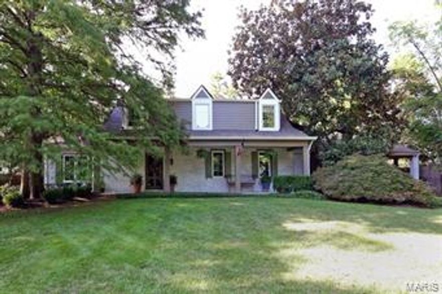 Blending the old with the new, this classic cottage and Bernoudy guest house has been transformed with today's attitude in mind. Drive under the porte-cochere and be surprised by the scope of this outstanding property. The 4 bedroom and 3 full bath main house has a formal LR with fireplace, cozy den w/vaulted ceiling and FP, top of the line eat in kitchen/hearth room, spacious family room with FP, bookcases and French doors  open to bluestone terrace, 1st floor laundry and office area. Second floor is the master suite with fireplace and three other generous bedrooms and a full bath. Walk under the covered entry to the separate guest house with sunny foyer, soaring vaulted ceiling great room with slate fireplace and dining area with small kitchen, full bath and bedroom. Behind the guest house is a beautiful pool and serene setting with classic designed gardens and landscaping. Charm abounds this truly one of a kind house in perfect harmony on premier Ladue lane.