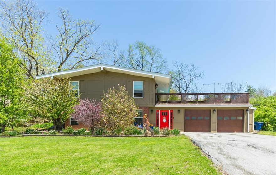 Open Sat. 4/19/25 1:30-3:30. Welcome to your dream home completely renovated w/open concept! Natural light flows through kitchen/dining/ and family room. Lovely wood look porcelain tile flooring  in LL guides you to a gourmet kitchen featuring stainless appliances, granite island, custom cabinetry, backsplash, built-in electric fireplace, Thermador oven, Bosch dishwasher, KitchenAide refrigerator. Upper level w/vaulted ceilings provides a spacious feel & rich hardwood flooring. Head to the 28'x22' deck & view your level back yard, perfect for entertaining! Stunning master w/private bth boasts surround shower, whirlpool tub, skylight, walkout, & vaulted ceiling. Secondary bedrooms-2 w/patio, 1 w/private bth & both w/vaulted ceiling. Carport was converted to 2 car garage. This NEW ADDITION makes a perfect office space w/new HVAC if you choose to utilize this space for living instead of garage! 3 Patios, great storage & laundry area, new entry. NEW HVAC, windows/doors complete in 19'.