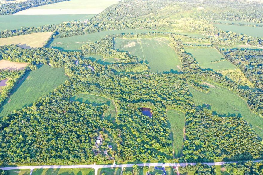 This farm is the perfect investment for the times we are living in. Farm land as well as farm commodity prices have increased significantly and many professionals look for continued strength in land. This is a very hard to find large piece of income producing ground. The property is within a very easy 45+/- minute drive of St. Louis and part of the land is bordering the Big River. Besides the farm production there is great recreational possibilities and possibly places to build a house. The land is bordered on two sides by very well maintained paved roads. This farm opens up the opportunity to own a piece of land to many buyers. Size, Location and price are all made to order with this purchase