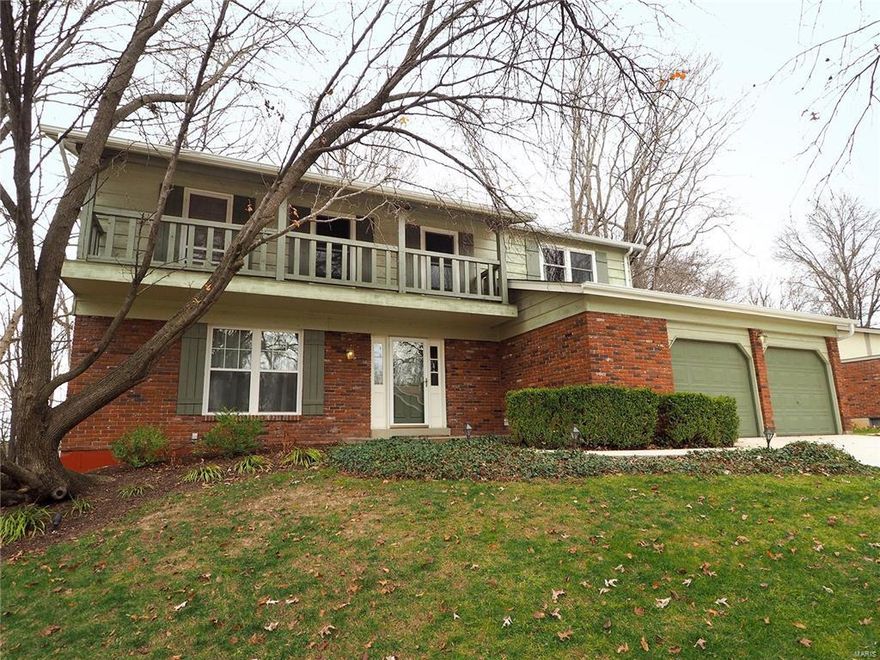 Dazzling 2 story! Beautiful wood floors in entry way, family room and master bedroom.  Light filled living room and separate dining room. Updated kitchen with tons of storage including a walk in pantry. Custom beamed ceiling in kitchen and breakfast room.  Built in bookcases flank the wood burning fireplace with gas starter. All baths have been updated including the gorgeous master bath with jet tub and separate shower. Enjoy the outdoors on the amazing screened in porch with custom light fixture. The finished lower level adds over 400 square feet of additional living space including a rec room and built in bar. New roof, gutters and driveway in 2015. Everything was completed with functionality and style in mind. Make this home your today!