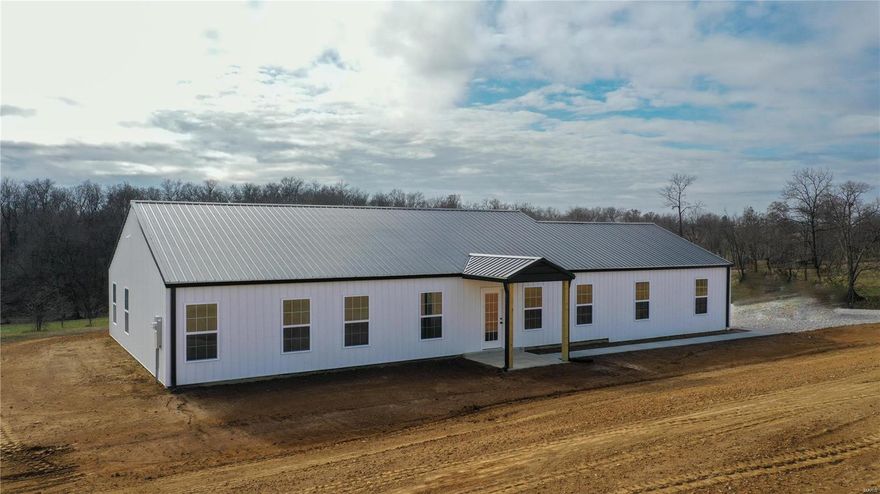 Brand new barndominium home on 31 acres in Lincoln County, Missouri!  Quality construction!  Designer touches.  Open ground for your horses or livestock.  Creek and woods for outdoor fun and hunting.  No restrictions in Lincoln County!  Your own pond to fish in! Brand new everything, come and see your new home!