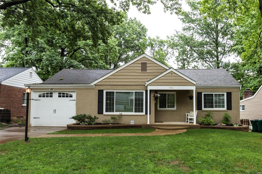 Welcome home to 1316 Lanvale Drive in sought after Webster Groves. This darling 3 bedroom, 2 bath brick ranch will steal your heart with its curb appeal and stepping inside from the covered front porch will seal the deal. You'll find hardwood floors throughout the light, bright, freshly painted main floor. The centrally located kitchen with granite, custom back splash, and stainless appliances is the vital hub of the home. Partially finished lower level with large rec space, full bath, laundry area, and plenty of storage. Phenomenal, well-planned outdoor entertaining space on the patio with built-in stone fire pit and bench seating steps down to the level, fenced yard. Bonus storage area in the space below the master, accessed from the patio, is perfect for storing your outdoor essentials. Attached, super-sized, one-car garage. Excellent location, close to schools, parks, and the rec center, with nearby access to highways and major thoroughfares for an easy commute. This is a must-see!