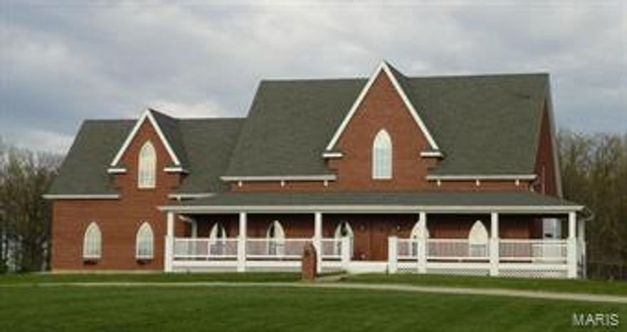 Luxury Home nestled quietly on 4+ acres with spectacular countryside views..  All brick beauty has over 5700 sq ft w/ 5 en-suite bedrooms. Most have jetted tubs, ceramic tile, Kohler fixtures & walk-in closets.  Main floor master bedroom w/bath has slate tiled soaking tub & over-sized shower.  Soaring 10' ceilings on the main level with optimal natural light & Brazillian wood floors. Spacious & open w/central gathering places. Custom cabinetry, windows & doors. Granite counter tops, Prep sink, 2 dishwashers, built-in buffet. Front & rear staircases. Spa area w/heart shaped jacuzzi, bidet & shower.  Media & family roomshare w/wet bar. Sauna room needs completion. Walk out lower level.  Custom in-ground outdoor pool with kiddie pool. 2 car over-sized garage with 1/2 bath.  Washer/dryer hookups on 3 levels. Water & air filtration system. Zone HVAC.  Huge shop/barn/Rv storage building. Suitable for Bed/Brk SpecialListingConditions: Foreclosure