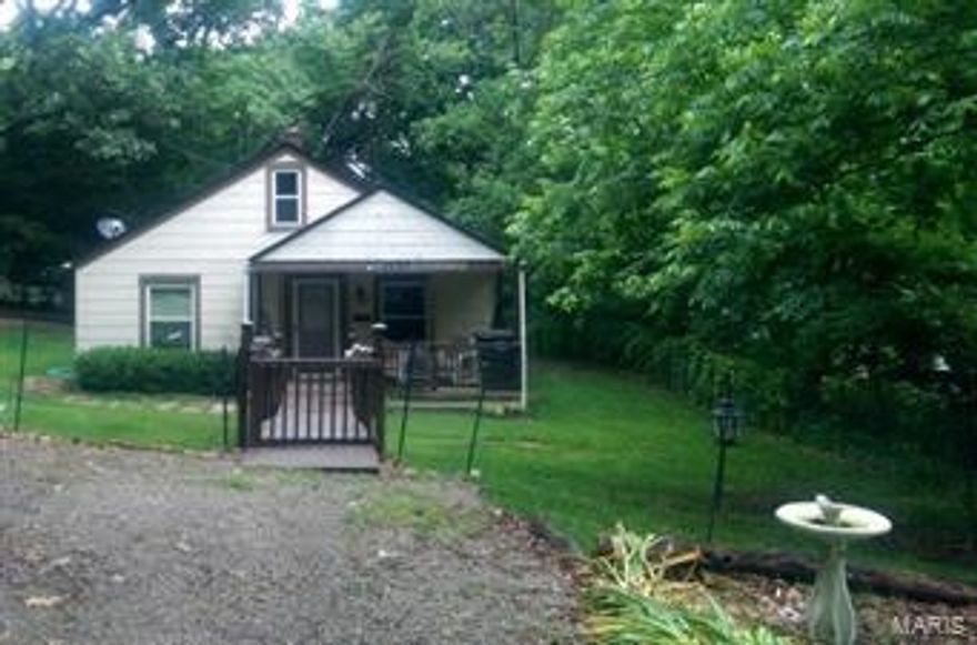 INVESTORS – Perfect home to add to your inventory.  All big ticket items where replaced in 2008 (Roof, windows, Hot Water Heater, Furnace, AC Unit).  Hardwood floors throughout most of the home. Paint the inside and move your renters in.  Last house on dead end street making parking a non-issue. Be sure you make plans to see this one, it won’t be on the market long.