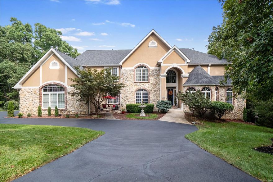 Private, Picturesque, Peaceful, Pristine, Luxurious describes this Custom Executive Estate home nestled right in the of heart Wildwood... In the ever-so-desirable Bartizan Pointe!!  This is a Showplace! Tremendous Value Magnificent Grand Foyer w/ sweeping stair case opens to Elegant Dining Room & Spectacular Great Room w/ Soaring ceilings & Stone Fireplace. Cooks Dream expanded Kitchen & Hearth is simply Spectacular! Professional Grade Appliance & Ultra High-End finishes. Glamorous Master Suite & Luxurious bath walk in euro shower and huge custom closets. Upstairs you'll find the most amazing bonus room w/ balcony overlooking the first floor! along with 4 additional bedrooms with one being the Princess Suite! Lower Level is a incredible. Magnificent Custom bar open to Family Room w/Stone Fire place, Indoor Hot Tub & Sauna, Game Room, Guest Room. No way to recreate this home near the price offered! Neighborhood adjacent to Rockwood Reservation! Award winning Rockwood Schools.