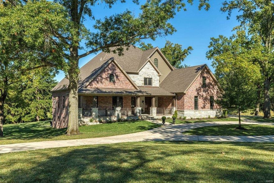 An impressive brick & stone elevation highlights the remarkable curb appeal of this spectacular 1.5 Sty from Kelly Custom Homes. Barrel-vaulted entry foyer opens to private study with built-in bookcases, elegant dining room framed by arched entryways, stunning great room with cast stone fireplace flanked by bookcases & light-filled sunroom with bank of windows & atrium door to deck. Designer kitchen with cherry cabinetry, granite countertops, premium appliances & double islands adjoins breakfast room & vaulted hearth room with floor-to-ceiling stone fireplace. Spacious master bedroom suite with octagonal ceiling, sitting room & marble bath with shower spa & jetted tub offers a relaxing retreat. The 2nd floor extends the living quarters with 4 additional ensuite bedrooms, 2 with sitting rooms. Walk-out Lower Level includes recreation room with 3rd fireplace & wet bar, media room & game room plus 6th & 7th ensuite bedrooms. Situated on a 1.2-ac lot with landscaped gardens, deck & patio. Additional Rooms: Sun Room