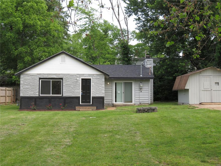 Don't miss this newly renovated home with 3 bedrooms, 1 bath and a spacious family room with a brick fireplace. Home sits back from road for extra privacy. Located in unincorporated St Louis County and in the Ritenour School District. New flooring, windows and doors along with fresh paint throughout. Kitchen is new top to bottom with stainless steel appliances, new cabinets and counters for a fresh, clean look. All new bathroom fixtures as well. Large shed on side of house. Don't wait on this one!!